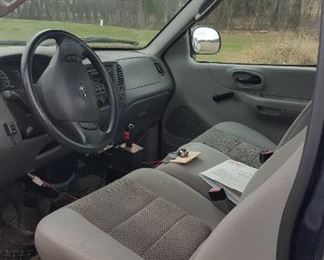 2003 Ford F150 4x4 Truck with V Boss plow, and Snow Ex Spreader , also has a stainless steal Delta Champion Tool Box, new battery. One owner. Mileage&nbsp;92140.6
