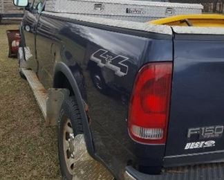 2003 Ford F150 4x4 Truck with V Boss plow, and Snow Ex Spreader , also has a stainless steal Delta Champion Tool Box, new battery. One owner. Mileage&nbsp;92140.6
