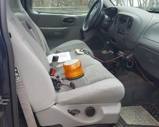 2003 Ford F150 4x4 Truck with V Boss plow, and Snow Ex Spreader , also has a stainless steal Delta Champion Tool Box, new battery. One owner. Mileage&nbsp;92140.6