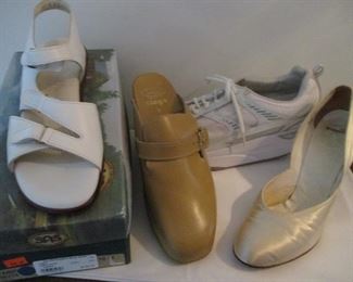 variety of shoes. the ones on far right are from 1950s, wedding shoes