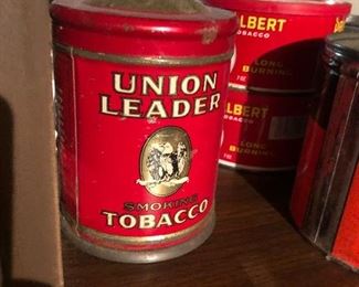 large collection of tobacco tins