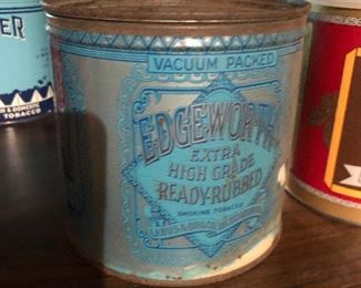 large collection of tobacco tins