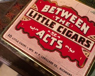 large collection of tobacco tins