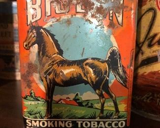 large collection of tobacco tins
