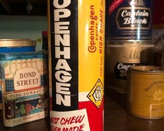 large collection of tobacco tins