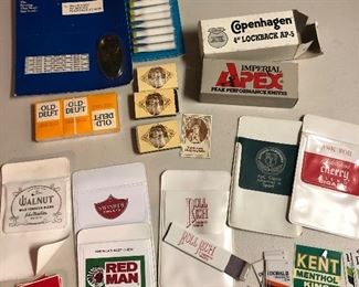 Huge selection of tobacco company promo items to include lighters, matches, belt buckles, money clips, clocks, scarves and more, multiples of many items. 