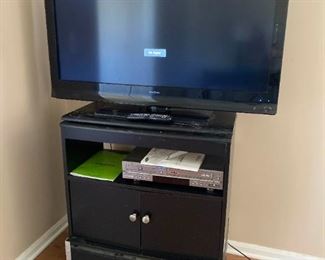 Insignia 42 Inch TV Samsung DVD and VCR and Cabinet