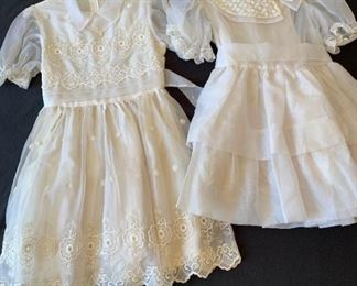 Two White Little Girl Dresses