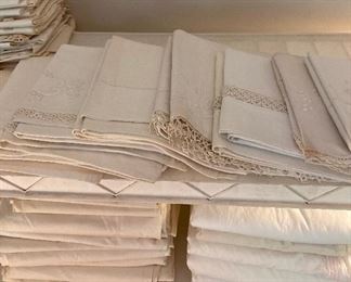 Linen with satin stitch embroidery and lacework 