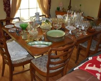 Beautiful Dining Room Table, Matching Chairs and China Cabinet, Table is loaded with China, Glassware and more!