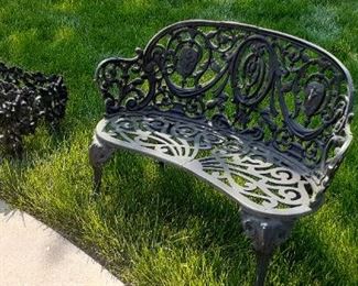 wrought Iron settee and planters 