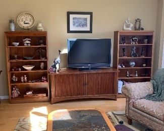 Living Room 
Stickley Mission style tv console, Cherry Stickley bookcases, cultural stone & wood items/carvings, slate coffee table 