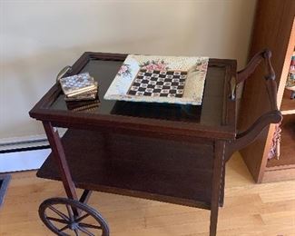 Living Room 
Tea cart, Mackenzie Childs coasters & plate