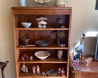 Living Room 
Stickley Cherry bookcases
Pottery, carvings, dolls, chess set