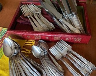Case Table 
Set of Silverplate flatware(Heirloom)