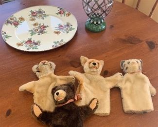 Case Table 
Steiff puppets, Mackenzie Childs enamel platter & glass vase