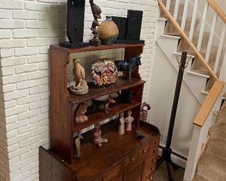 Foyer 
Bottom early cabinet sold separately from shelf unit
Various pottery by Sylvia Settel & from Mexico/Africa 