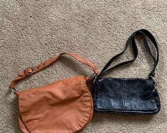 Bedroom One 
Coach purses