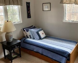 Bedroom Three
Trundle bed, pottery lamp, nightstand 