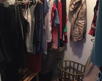 Closets filled with top brand women's clothing.