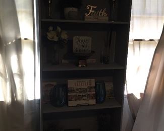 This shelf holds the head of the gator that got Poke Salad Annie's Granny. Chomp, Chomp Chomp.