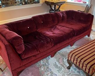 Red velvet couch...25" high x 90" long x 35" deep