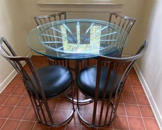 30"high x 36" diameter; chairs are 32" high x 16" diameter