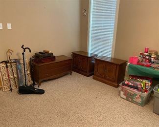 Assorted furniture, gift wrap and canes.