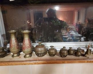 Pakistan and India brass items including Sarna elephant claw bells.