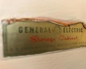 The 1957 Kitchen in the home is outfitted with the original GE storage cabinets.  All kitchen cabinets  and push button stove top will be removed for YOUR  mid-century kitchen renovation.  Inquire if interested