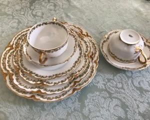Limoges dinner set .  Cloverleaf  pattern.  Lovely 102 pieces including toureens, sugar and creamer, cake plate, soup bowls with two handles.    Minor blemishes on a few items but MOSTLY all in mint condition.