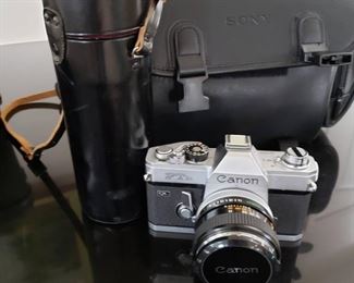 Canon  35mm camera and case with accessories