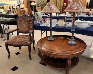 Round leather top coffee table with bottom shelf!