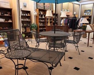 Wrought iron patio set, lounge chair, and table. Umbrella is also for sale!