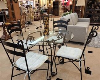 Wrought iron glass table, 4 chairs, and cushions - love this!!