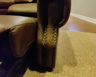 3 - SEAT ELECTRIC RECLINING LEATHER THEATRE SEATING - HAS SOME MINOR WEAR IN THE HEAD REST ON 2 OF THE CHAIRS - NAIL HEAD TRIM