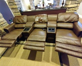3 - SEAT ELECTRIC RECLINING LEATHER THEATRE SEATING - HAS SOME MINOR WEAR IN THE HEAD REST ON 2 OF THE CHAIRS