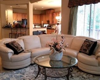 Leather sectional, excellent condition; glass & iron coffee table & side table
