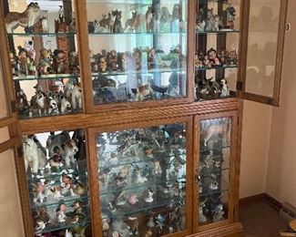 Lighted China Cabinet filled with Hummels,
Rosenthal,
Goebel, Royal Doulton,
& lladro figurines.