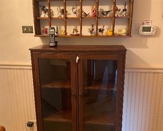  Bookcase
Wall mount shelf and bird figurines
