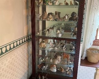China Cabinet Filled with Bird Figurines