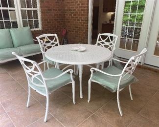 This is a Woodard patioset that has never been used.  It was ordered by our clients mother in 2021.  She paid $6500 for the set. Due to supply chain issues, it arrived 1 year later. It arrived 1 week before she passed away, and thus was never used or sat on. We are starting this set at $4500 and will not go to half off on last day.  Price is for entire patio set. 