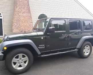 2010 Hard  top Jeep, hunter green in color, 131,556 miles $18,500