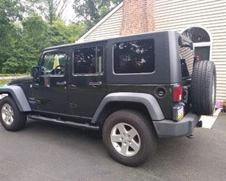 2010 Hard  top Jeep, hunter green in color, 131,556 miles $18,500