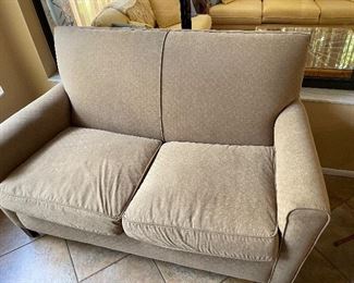 Beige loveseat