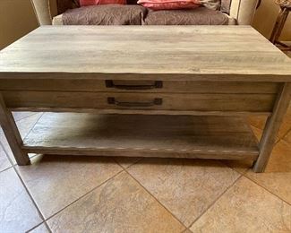 Coffee table with lifting top