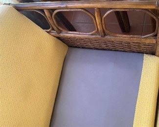 Rattan and upholstered couch