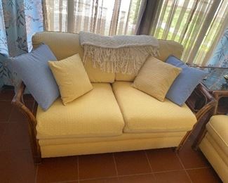 Rattan and upholstered love seat with cushions 58" wide