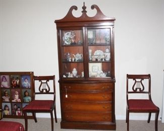 China cabinet filled with trickets.  Cabinet will be priced at $125 Sunday  after we have applied the 50% off.  Chairs are sold.