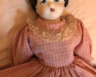Another porcelain headed doll.  Outfit might indicate it's pretty old.
